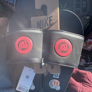 Nike Black Slides with Red Logo
